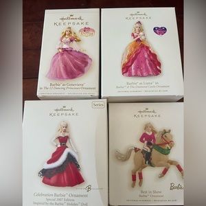 4 New Barbie Hallmark ornaments .